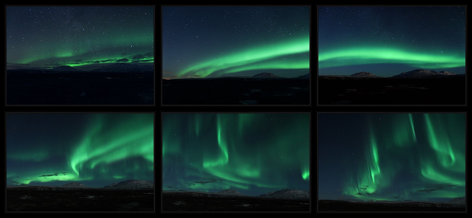 The aurora borealis in ribbons above a winter valley